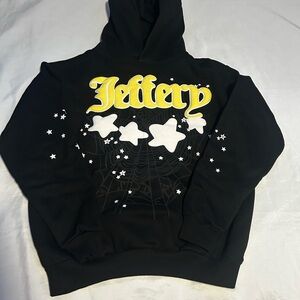 Jeffery Black Hoodie with Yellow and White Star Design